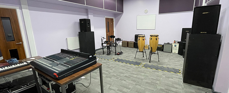 Photo of an empty live performance rehearsal room
